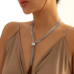 Elegant Multi-Layered Geometric Tassel Necklace - Image 3