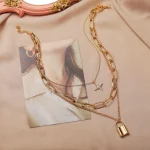 Elegant Multi-Layer Lock and Star Pendant Necklace - Image 3